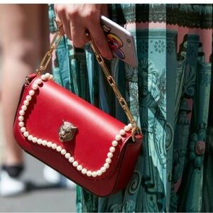 Gucci Chic Red Shoulder Bag with Pearl Detail